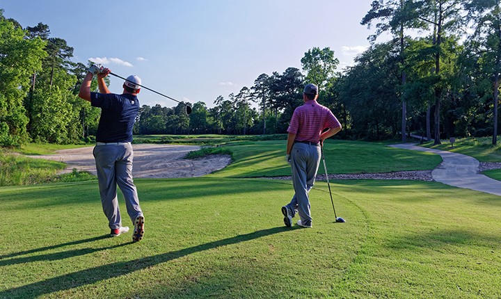 cypresswood golf club houston golf course 2 golfers teeing off